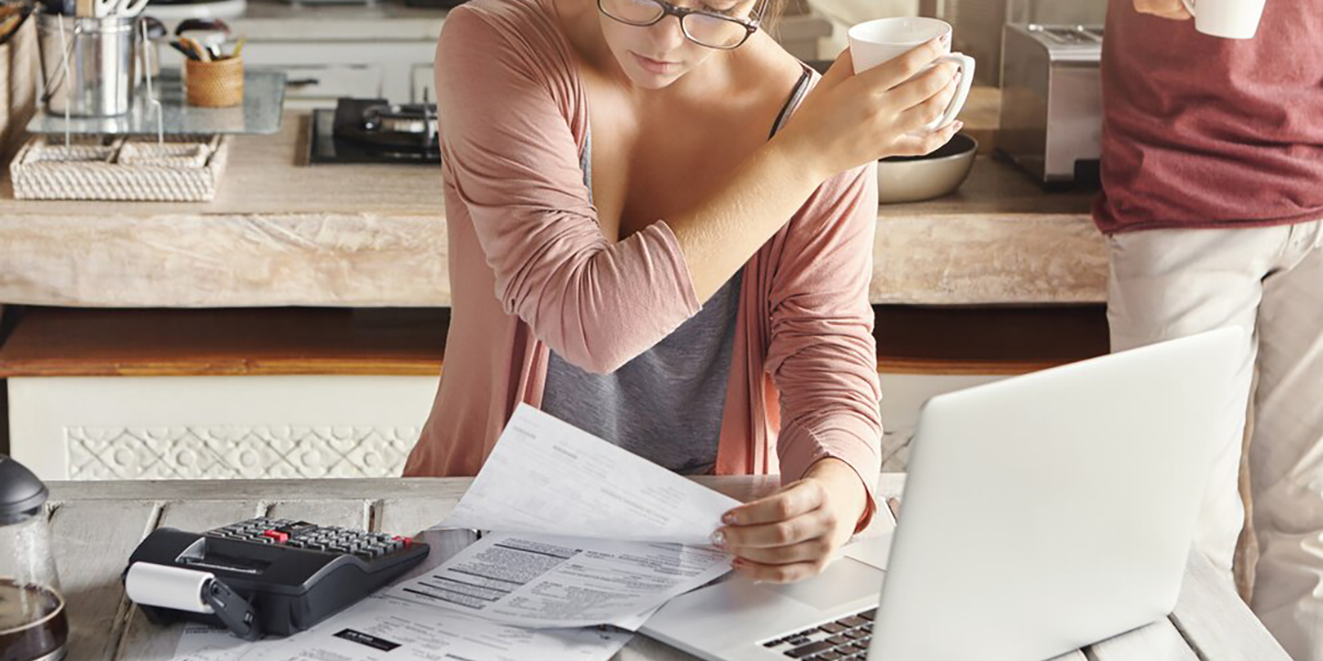 business woman owner cheering that they have reduced their business debt